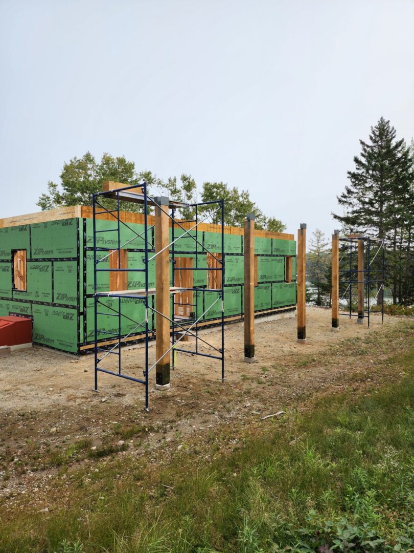 A building under construction with scaffolding around it.