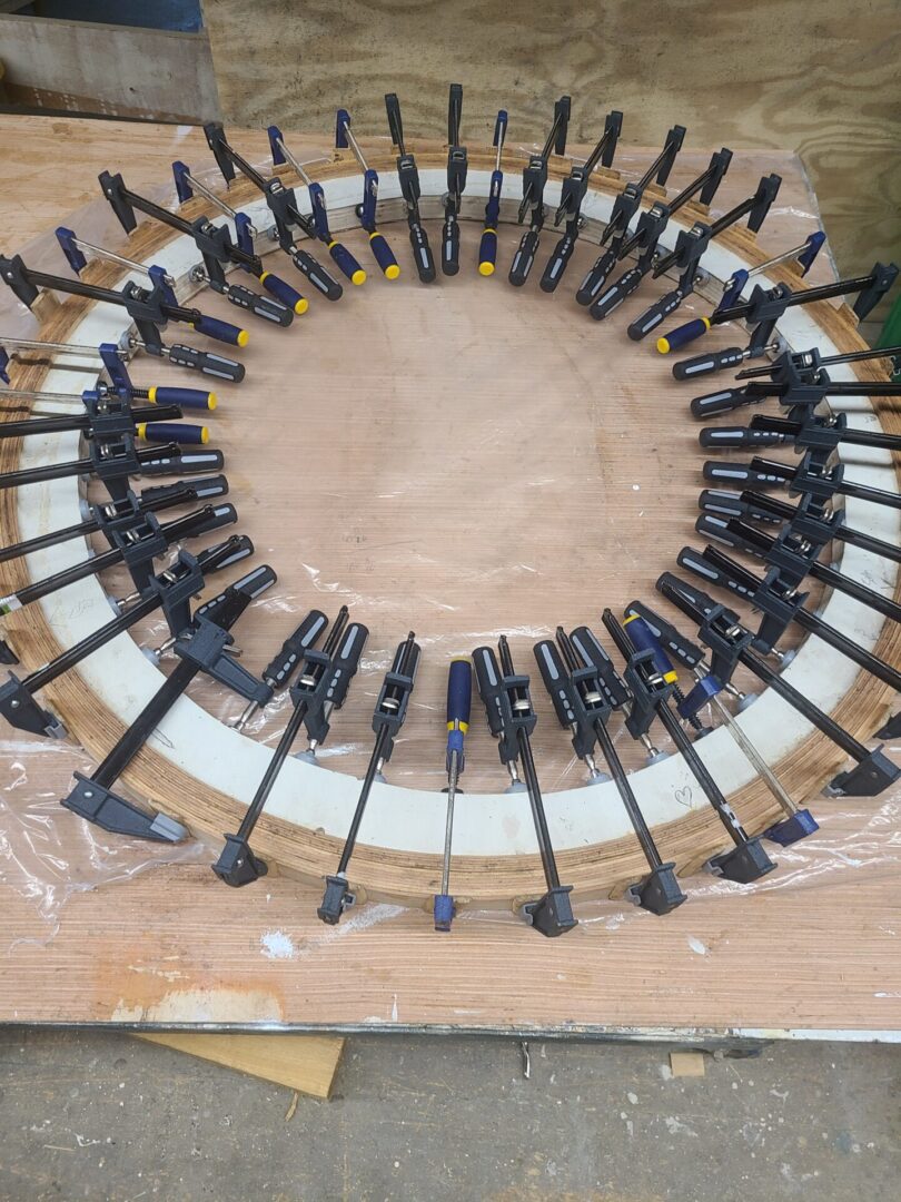 A circular pattern of tools on top of a table.