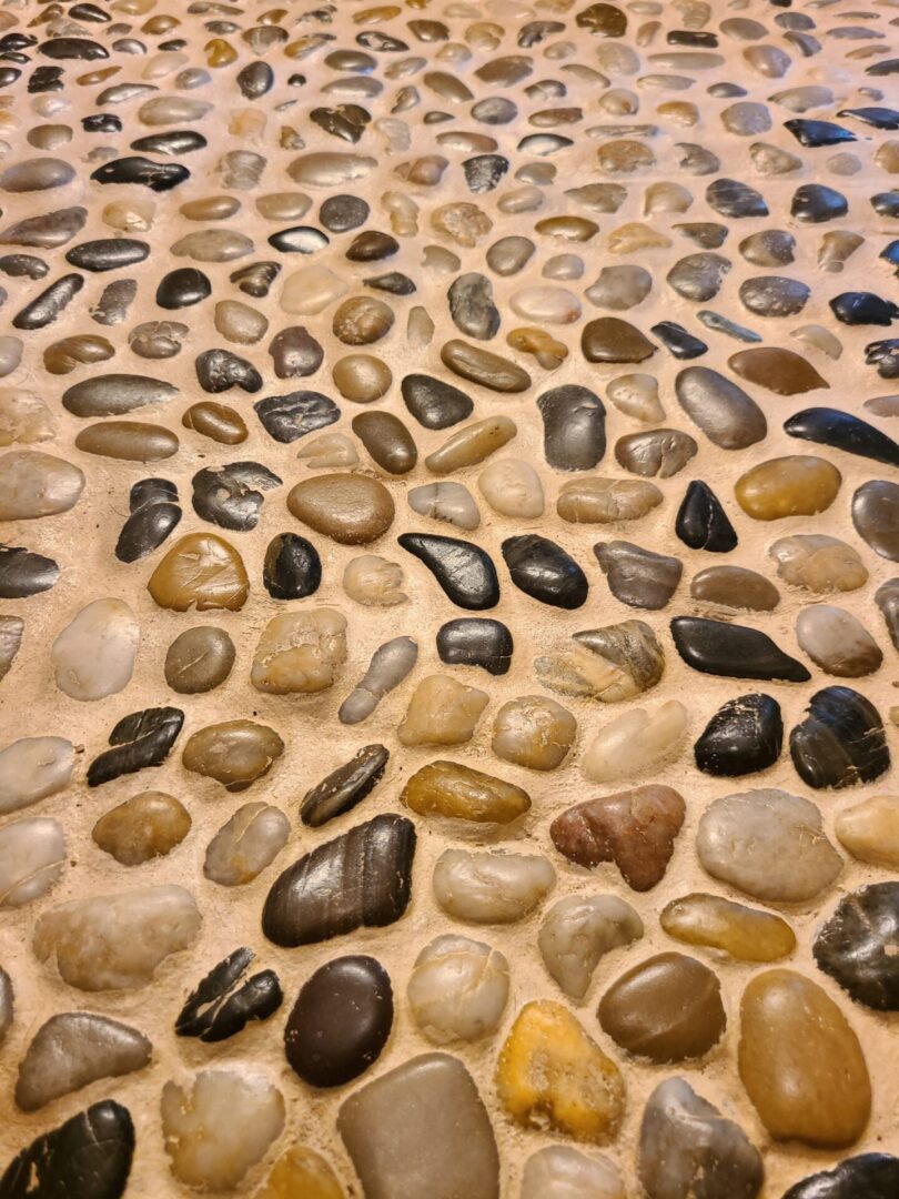 A close up of many different colored rocks