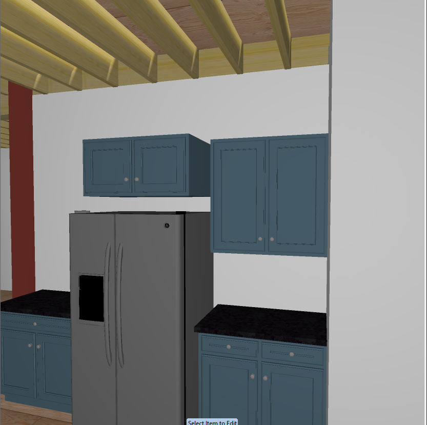 A kitchen with blue cabinets and black counter tops.