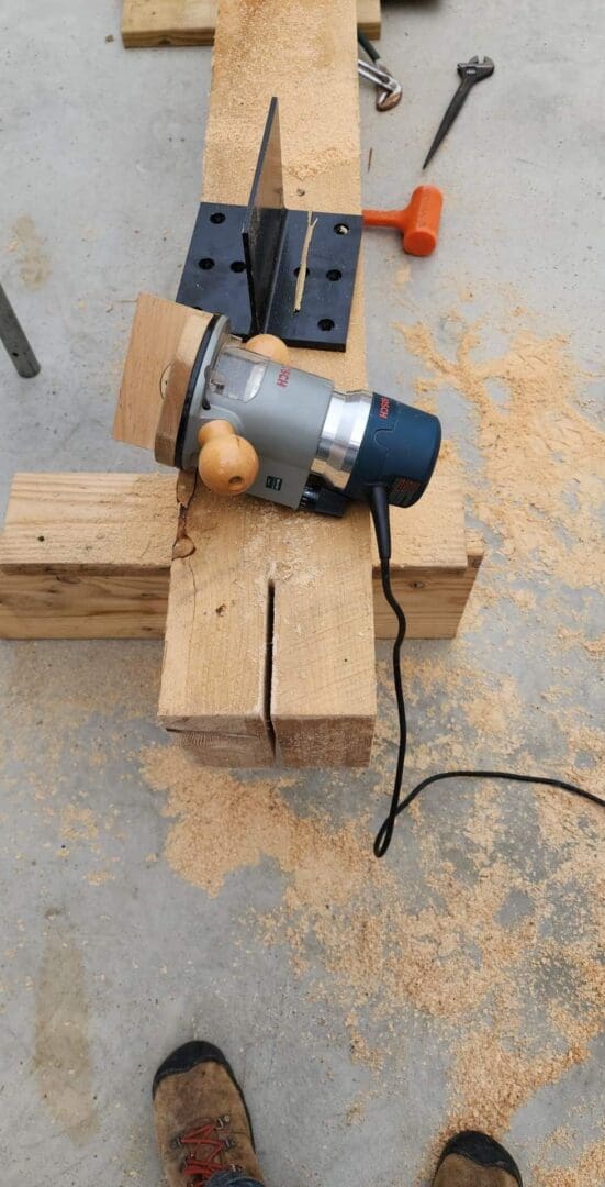 A wood block with an electric grinder on it.